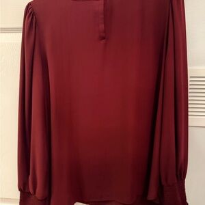 The LOFT woman’s  burgundy blouse size xL.